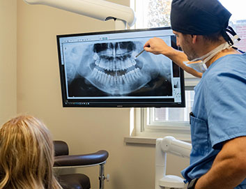 Dentist explaining x-ray