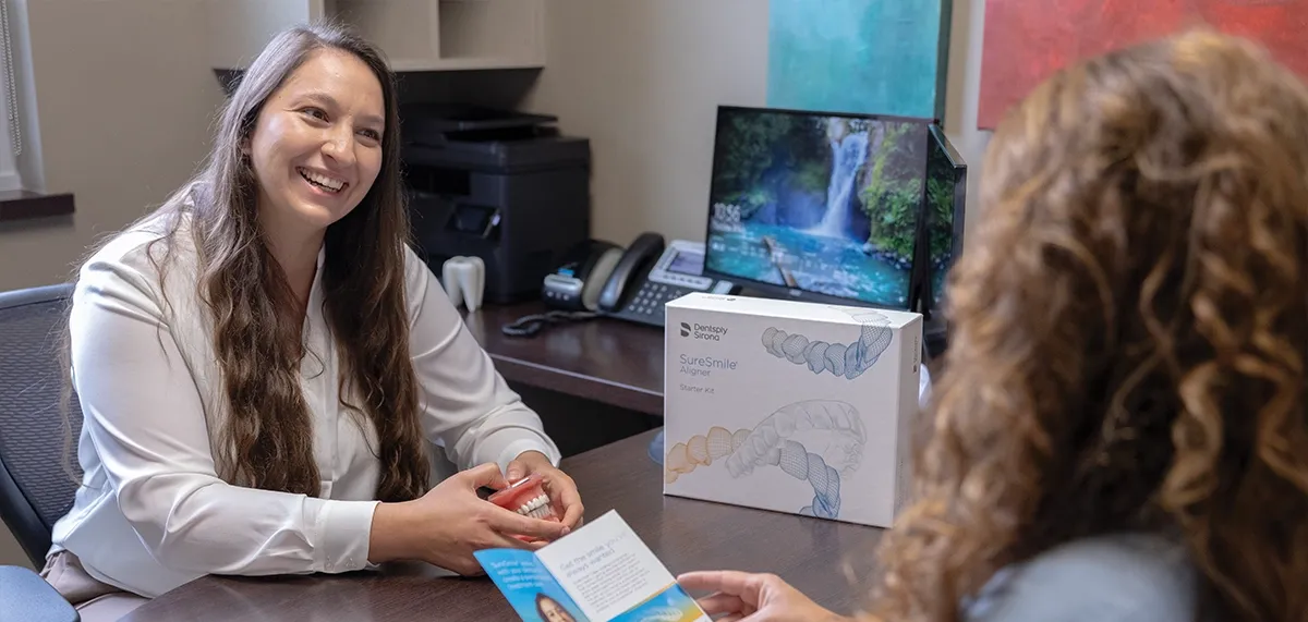 Dr. Militaru conversing with patient